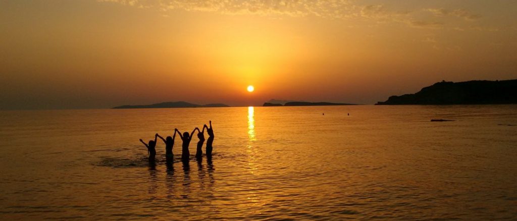 Image of kids in the sunset